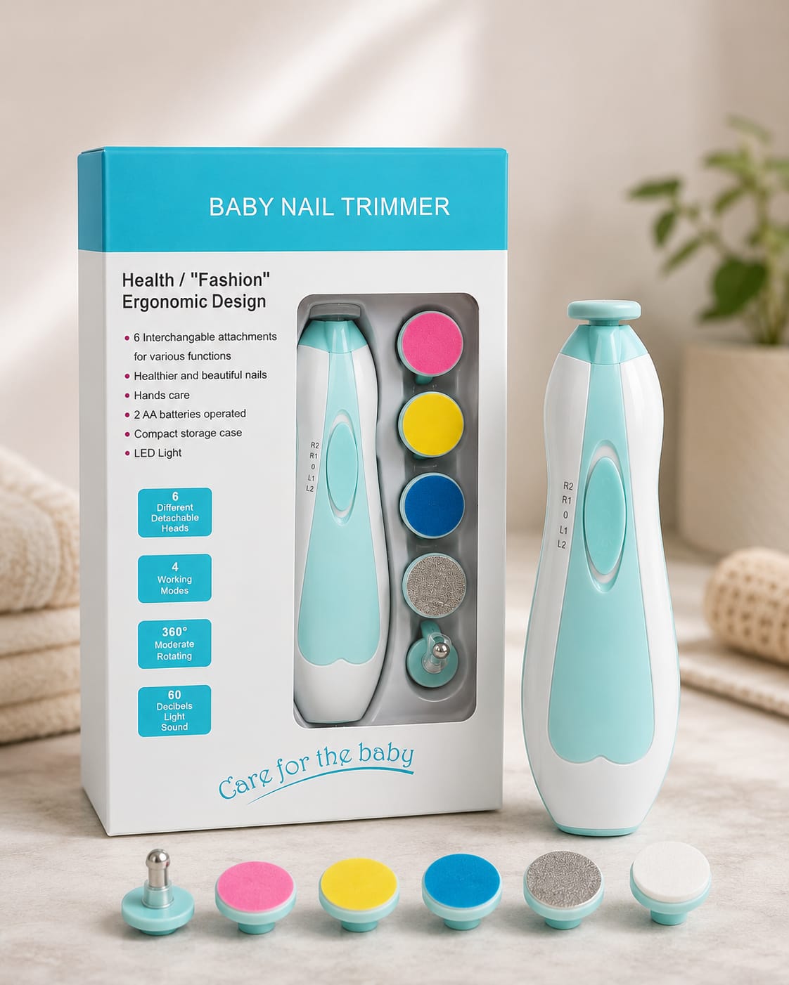 Baby nail trimmer set with its retail box, shown on a soft neutral background. The set includes a mint and white electric nail trimmer, six interchangeable nail files in pink, yellow, blue, gray, and white, and the product packaging labeled 'BABY NAIL TRIMMER'.